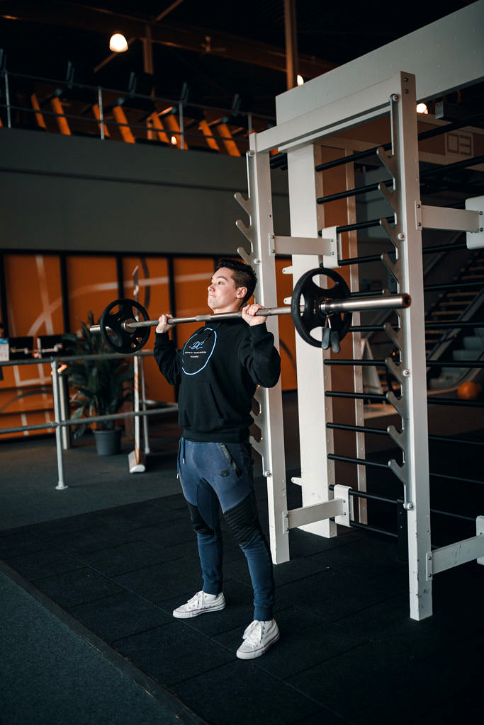 Behind the neck press