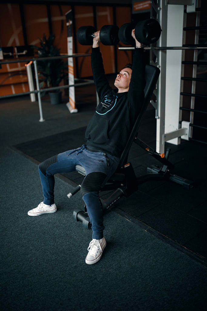 Seated dumbbell shoulder press