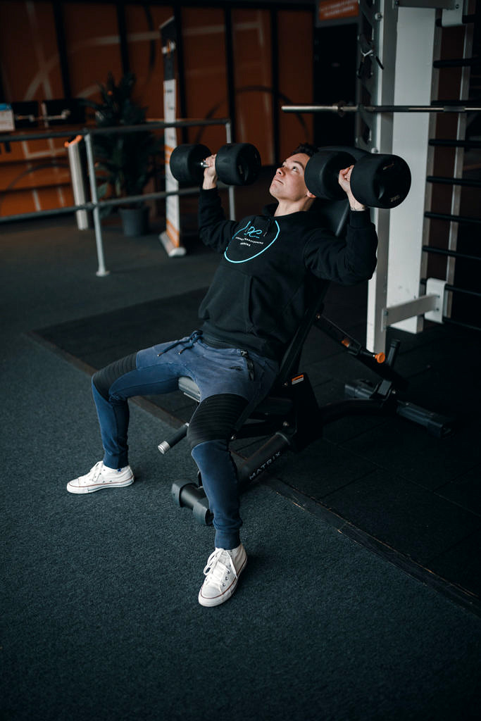 Seated dumbbell shoulder press